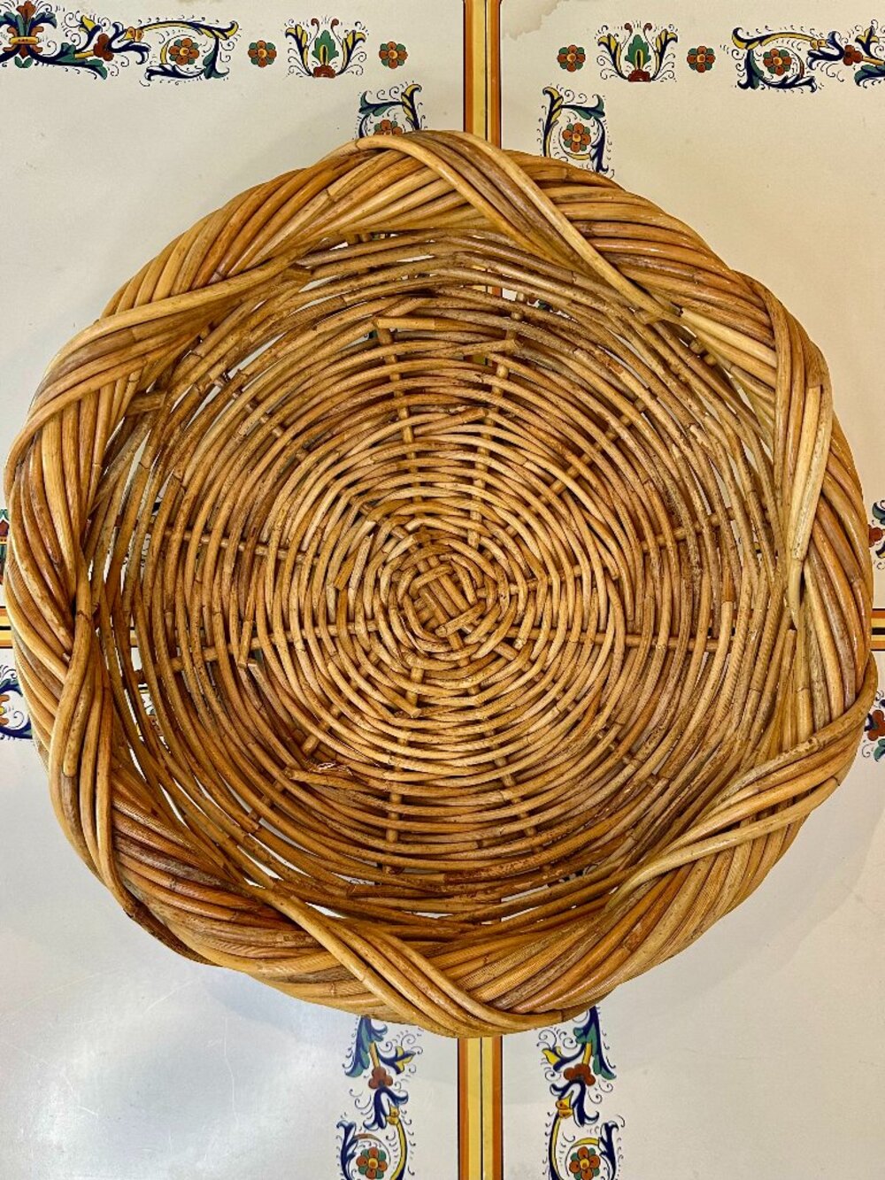 vintage round, hand-woven rattan or wicker basket
